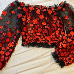 Fashion Nova top. Black with red flowers. One time use. $15 or best offer